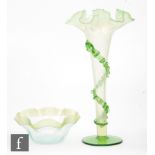 A late 19th Century Stourbridge glass posy vase of footed trumpet form with a frill rim and