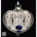A late 19th Century Stevens & Williams clear crystal glass liqueur set comprising shouldered