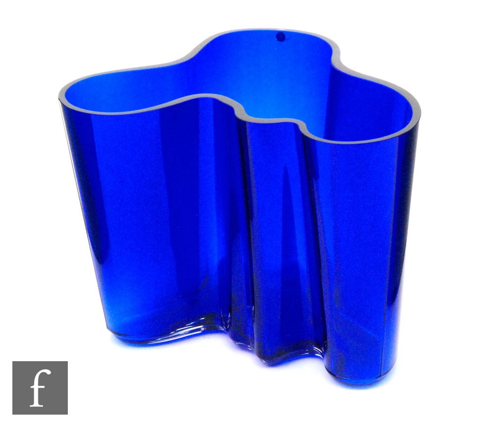 A later 20th Century Iittala glass Savoy vase by Alvar Aalto, of typical form in cobalt blue,