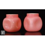 A pair of late 19th Century John Walsh Walsh crushed strawberry vases of shouldered form with four