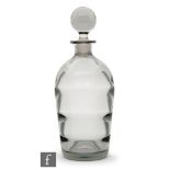 A 1940s crystal glass decanter designed by Elis Bergh for Kosta, of tapering ribbed optic form below