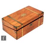 A 19th Century mahogany brass corner and banded writing box, the interior fitted with two ink wells,
