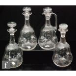 A set of three decanters in the manner of James Powell & Sons, all of ovoid dimpled form with