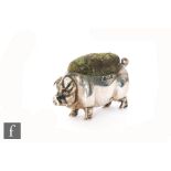 A hallmarked silver pin cushion modelled as a standing pig, length 5cm, Birmingham 1904, Levi &