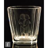 A 20th Century Hadeland glass vase of compressed octagonal form, engraved with two figures embracing