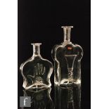 A clear crystal glass decanter by Erik Hoglund for Boda, of shouldered flask form relief moulded