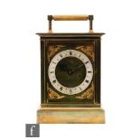 A 20th Century brass cased carriage type mantel clock, with single fusee, the 15cm brass dial with a