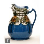 Frederick Rhead - Bursley - An early 20th Century 'Cosy' hot water jug decorated in the Trellis