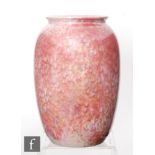 Ruskin Pottery - An ovoid vase decorated in an all over mottled pink lustre glaze, impressed marks