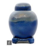 Ruskin Pottery - A large crystalline glaze ginger jar and stand, the jar and domed cover of ovoid