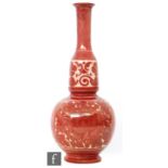 Attributed to Maw & Co - A large early 20th Century Arts and Crafts ruby lustre vase of footed ovoid