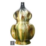 Christopher Dresser - Bretby Pottery - A late 19th Century double gourd form vase, with pinched