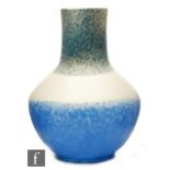 Ruskin Pottery - A crystalline glaze vase of angular form with a cylinder neck decorated in a