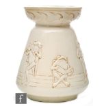 Bretby Pottery - A Frog Band vase, the ivory glazed body relief moulded with six frogs playing