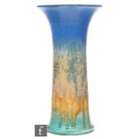 Ruskin Pottery - A crystalline glaze lily vase of flared cylindrical form decorated in a mottled and