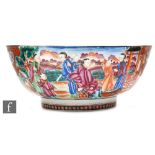 A Chinese Qianlong period (1735-96) Mandarin pattern bowl, rising from a high footring the