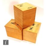 A collection of 20th Century Japanese interlocking lacquered and plain boxes, various character
