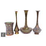 A collection of late 19th/early 20th Century Indian, Kashmir style copper and brass vases, to