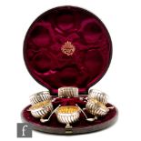 A cased set of six Victorian hallmarked silver open, circular salts and spoons, Birmingham 1882,