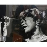 FRANCINE WINHAM (1937-2013) - Ella Fitzgerald singing, monochrome photograph, signed and dated