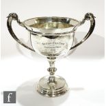 A hallmarked silver twin handled trophy 'The Delgany Golf Cup', height 23cm, weight 14.5oz,