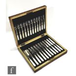 A cased set of twelve early 20th Century silver plated and mother of pearl handled dessert knives