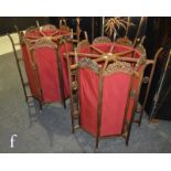 A pair of contemporary Chinese standing lanterns of octagonal form with carved lotus pediments,