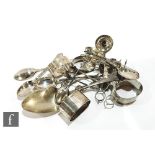 A small parcel lot of assorted hallmarked silver items to include four napkin rings and various