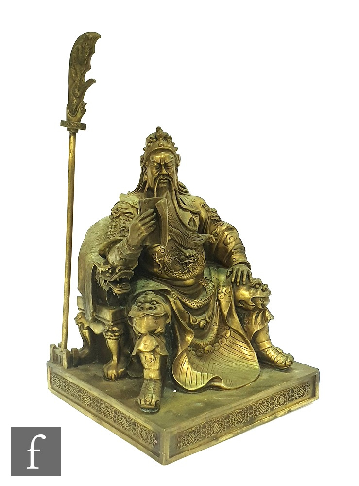 A contemporary cast metal figure of a Japanese seated warrior raised on square plinth base, the