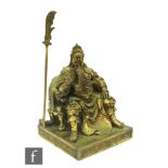 A contemporary cast metal figure of a Japanese seated warrior raised on square plinth base, the