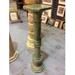 A small 20th Century green alabaster pedestal with collar and spiral detail on octagonal base,