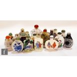 An assorted collection of twenty 20th Century Chinese snuff bottles of varying form to include