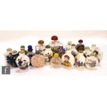 An assorted collection of twenty 20th Century Chinese snuff bottles of varying form, to include