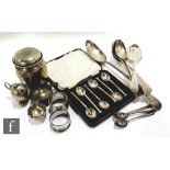 A small parcel lot of assorted hallmarked silver items to include Georgian and later basting,