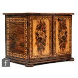A 19th Century Tunbridgeware mosaic inlaid table cabinet fitted with three drawers enclosed by a