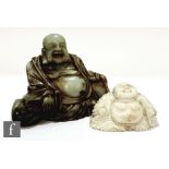 Two carved hardstone figures of Hotei, each modelled as the seated jovial monk, to include a green
