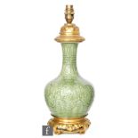 A late 19th to early 20th Century Sevres Chinese style celadon glazed vase converted to lamp base,