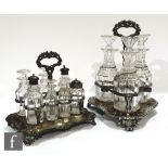 A 19th Century silver plated three bottle decanter stand with faceted cut clear glass decanters,