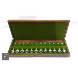 A cased set of twelve hallmarked silver tea spoons 'The Royal Horticultural Society Flower