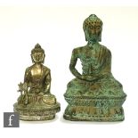 Two figure cast metal examples, each raised on lotus throne bases, height 20cm and 30cm. (2)