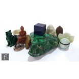 A malachite natural fragment, a malachite seated cat, a small buddah, a pale green hardstone