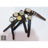 A mid 20th Century gentleman's wrist watch with six other assorted wrist watches, A/F. (7)