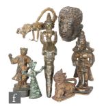 A collection of Chinese, Indian and Himilayan votive figures, to include Je Tsongkhapa, shishi,