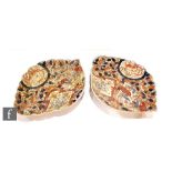 A pair of Japanese Imari leaf form dishes, circa 1900, decorated with panels of ho-ho birds and