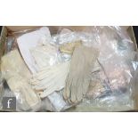 An extensive collection of 19th and 20th Century kyd and leather lady's gloves, also various woollen