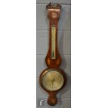 A George III inlaid mahogany barometer incorporating a thermometer above silvered silvered dial