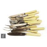 A set of six hallmarked silver bone handled fish knives and forks, Sheffield 1931, with a small