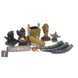 A collection of 19th to 20th Century Chinese and Tibetan metalwork items to include a Chinese silver