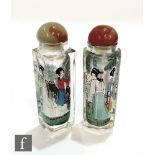 Two Chinese inside painted snuff bottles, the faceted glass bottles painted with figures inside