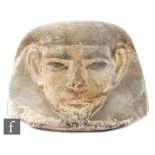 An Egyptian human-headed large limestone canopic jar lid with traces of paint, height 13cm, diameter